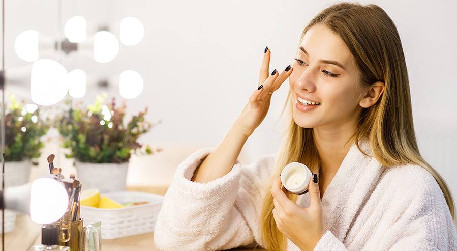 A Woman Applying a Skincare Product