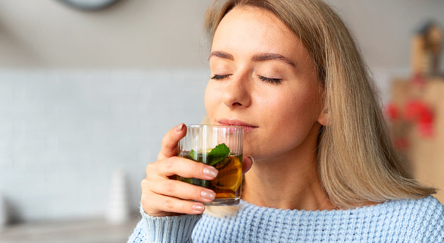 A Woman Drinking Peppermint Tea