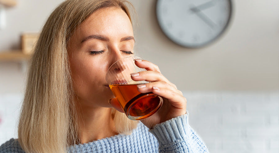 A Woman Drinking Tea