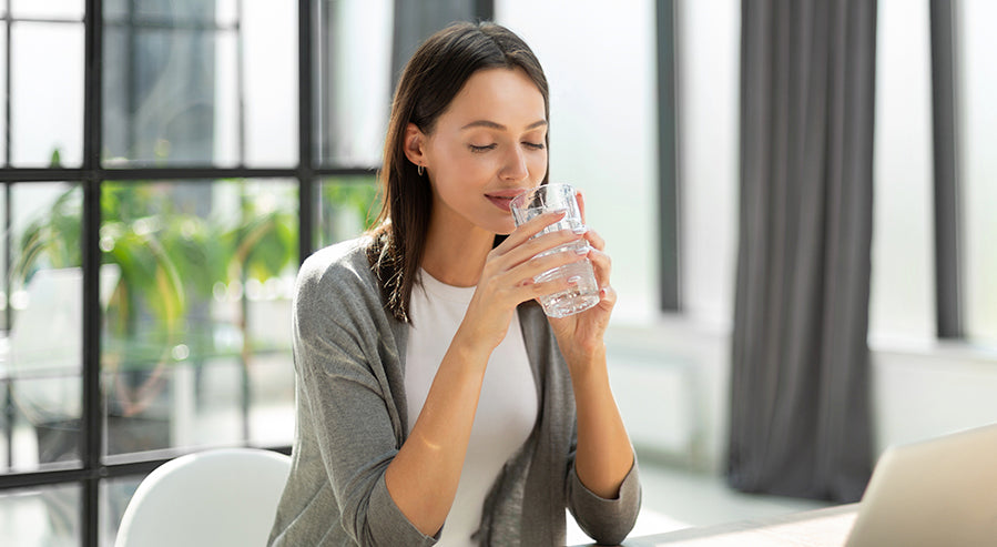 A Woman Drinking Water