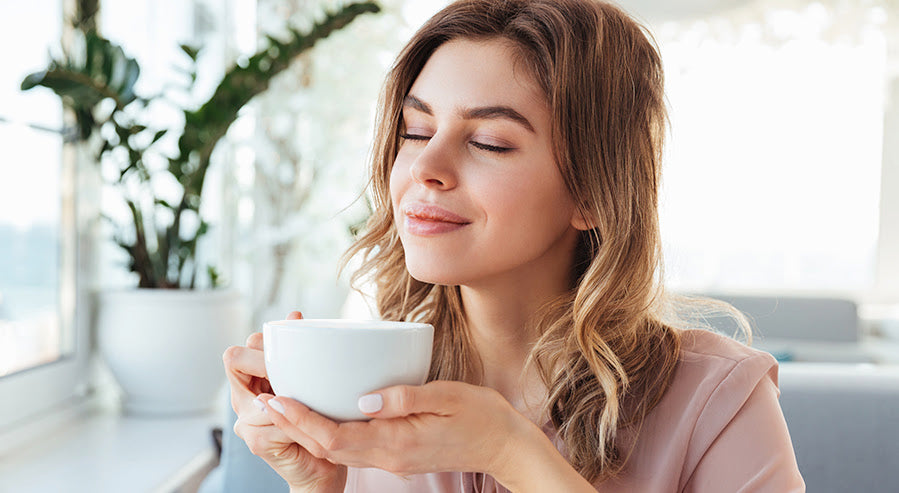 A Woman Drinking White Tea