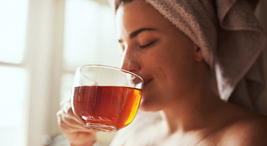 A Woman Drinking a Tea