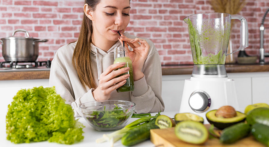 A Woman Drinking an Alkaline Smoothie