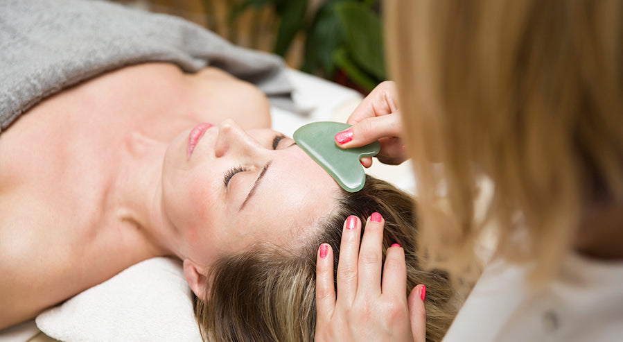 A Woman Receiving a Gua Sha Treatment