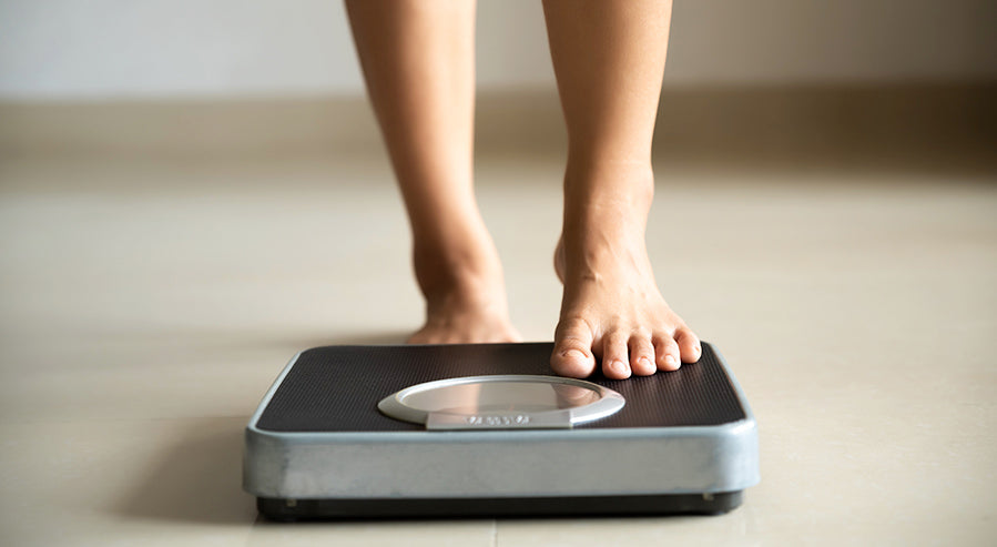 Person Measuring Their Weight