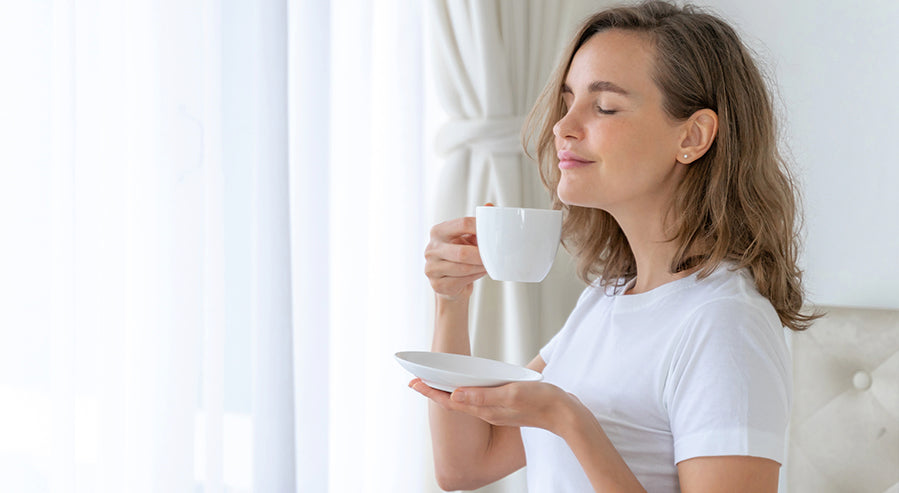 Woman Drinking a Cup of Tea