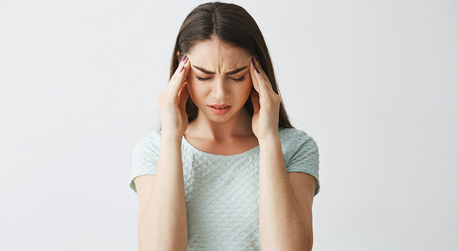 Woman Managing a Headache