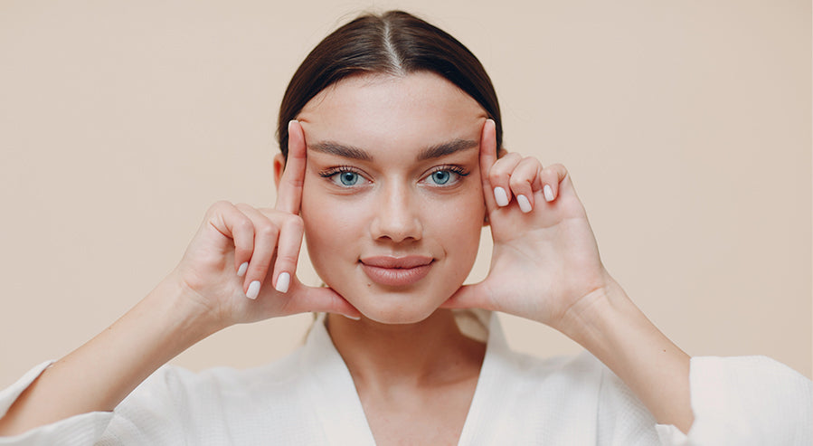 Woman Performing Facial Exercises