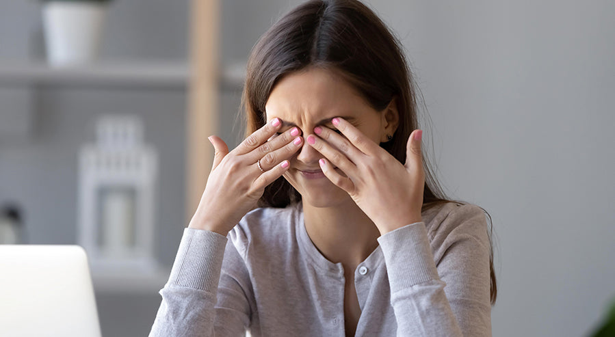 Woman Rubbing Her Eyes