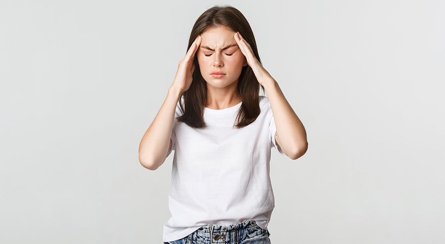 Woman Suffering From a Headache