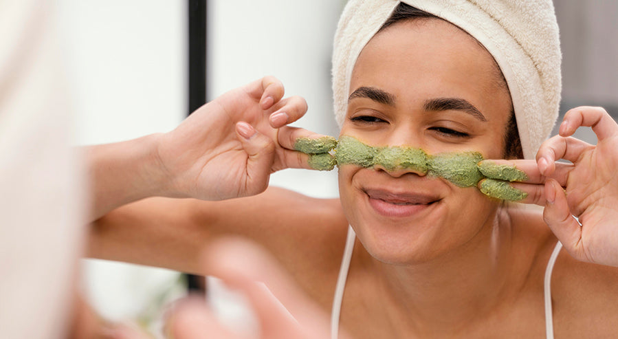 Woman Using a Spirulina Skin Product