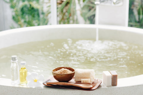 Hot bath with soaps, oils and running water