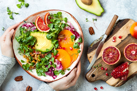 Citrus salad with pomegranate beets orange mixed greens