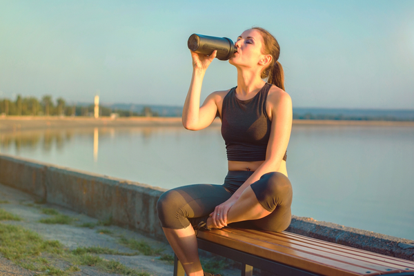 drinking a protein shake after a walk