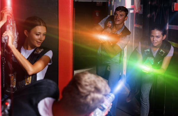friends playing laser tag