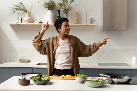 Woman celebrating a healthy meal prep