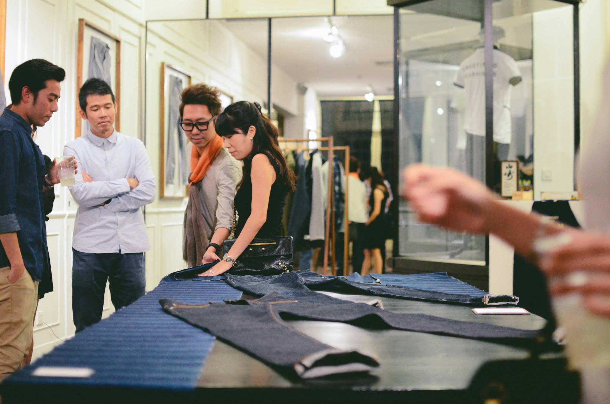 Customers get a feel of the fabric used