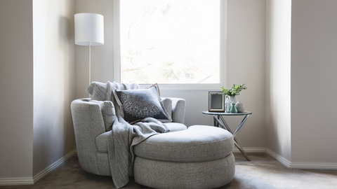 lounge chair decorated with throws