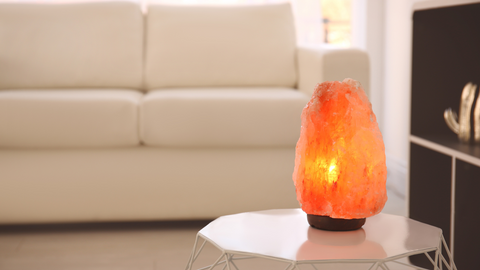 salt lamp on a side table in a living room