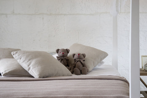 teddy bears on bed