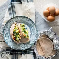 Spinach, feta and scrambled egg pitas