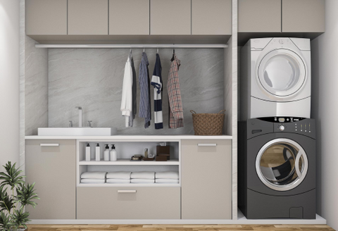 new laundry with appliances stacked 