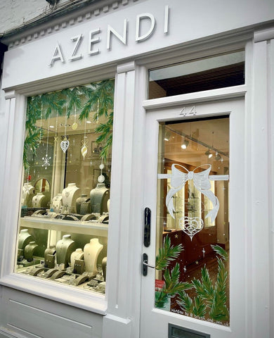 Painted window illustrations in jewellery store