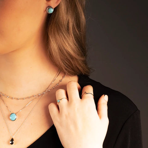 Layered silver and turquoise jewellery