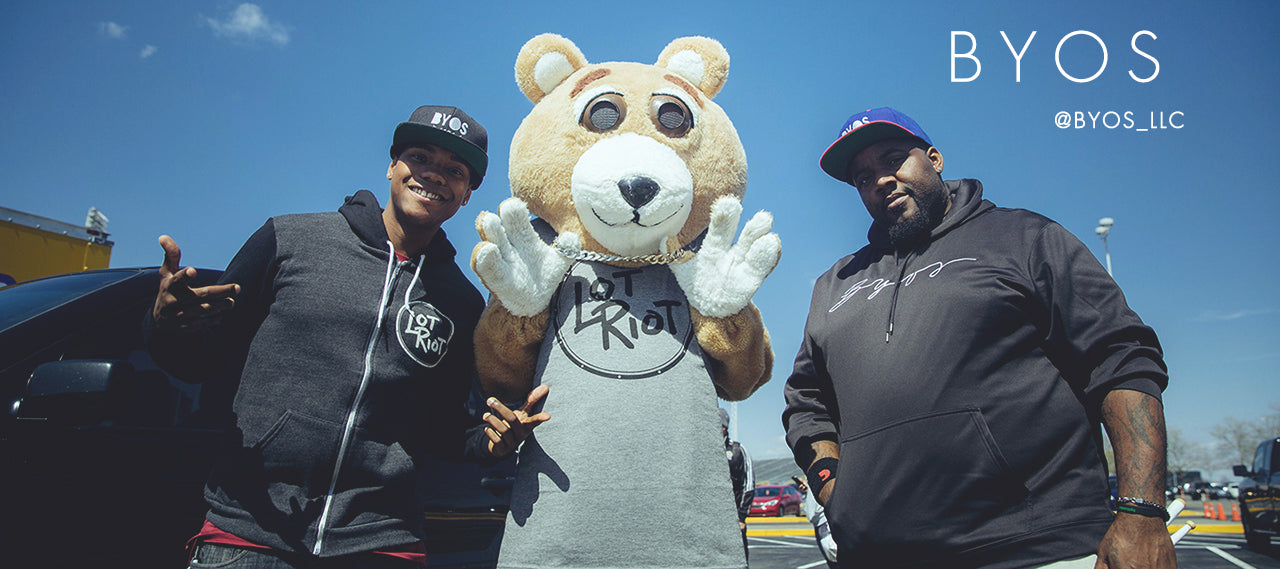 Drum duo BYOS wears Lot Riot apparel with Leon the Bear