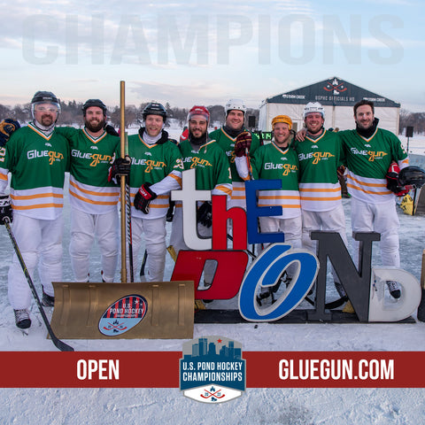 U.S. Pond Hockey Champions stand next to golden shovel award