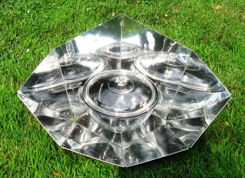 https://cdn.shopify.com/s/files/1/0193/3346/files/HotPot_solar_cooker_with_panel_reflector__5_liter_capacity__front_view_large.png?1301461802479630484