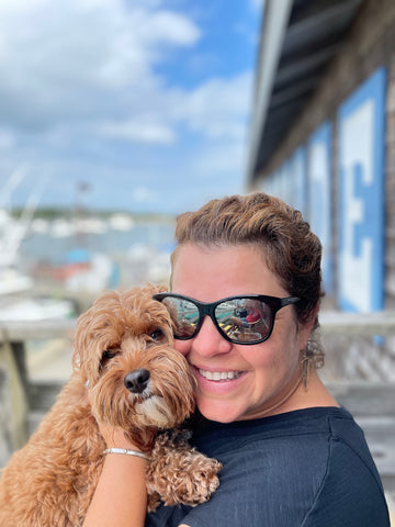 Woman with Cavapoo Dog  by Ocean