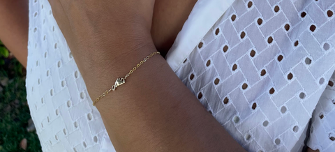 Martha's Vineyard charm on a 14 karat gold bracelet