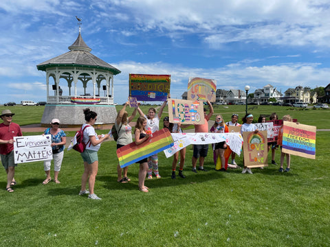 People Holding Signs at Pride Celebration in Oak Bluffs Ocean Park