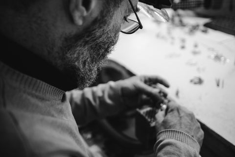 Artisan crafting a unique jewelry piece in a Chania, Crete workshop