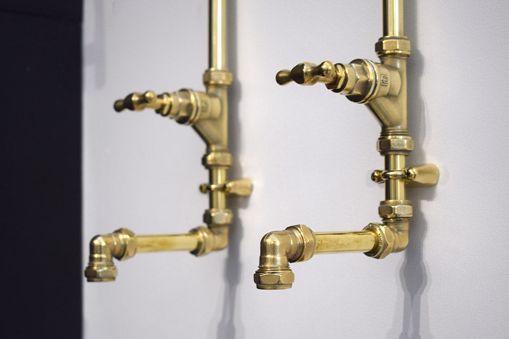 brass wall mounted taps made by Proper Copper Design