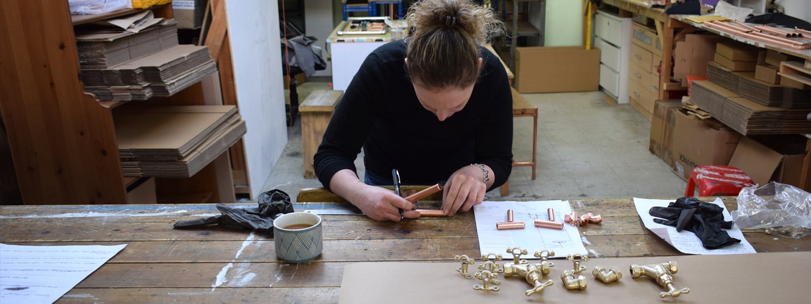 lady working at desk building orders