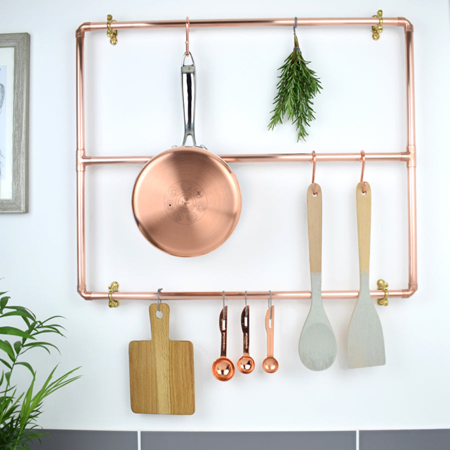 https://cdn.shopify.com/s/files/1/0194/2333/0368/products/copper-pot-and-pan-rack-contemporary-modern-industrial-kitchen-storage-solution-modern-practical_900x.jpg?v=1579125771