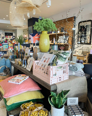 inside quince & cook's store a table of interiors, gifts, homewares and cookware products