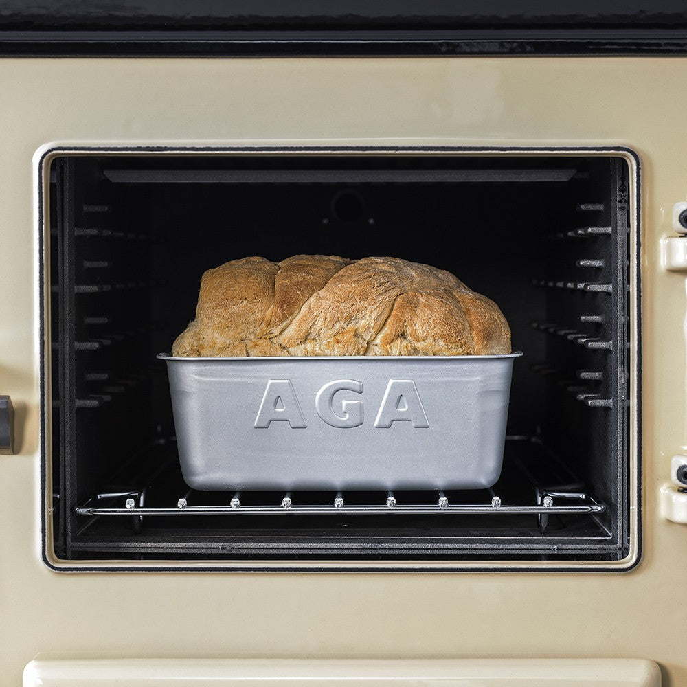 aga loaf pan with bread in oven