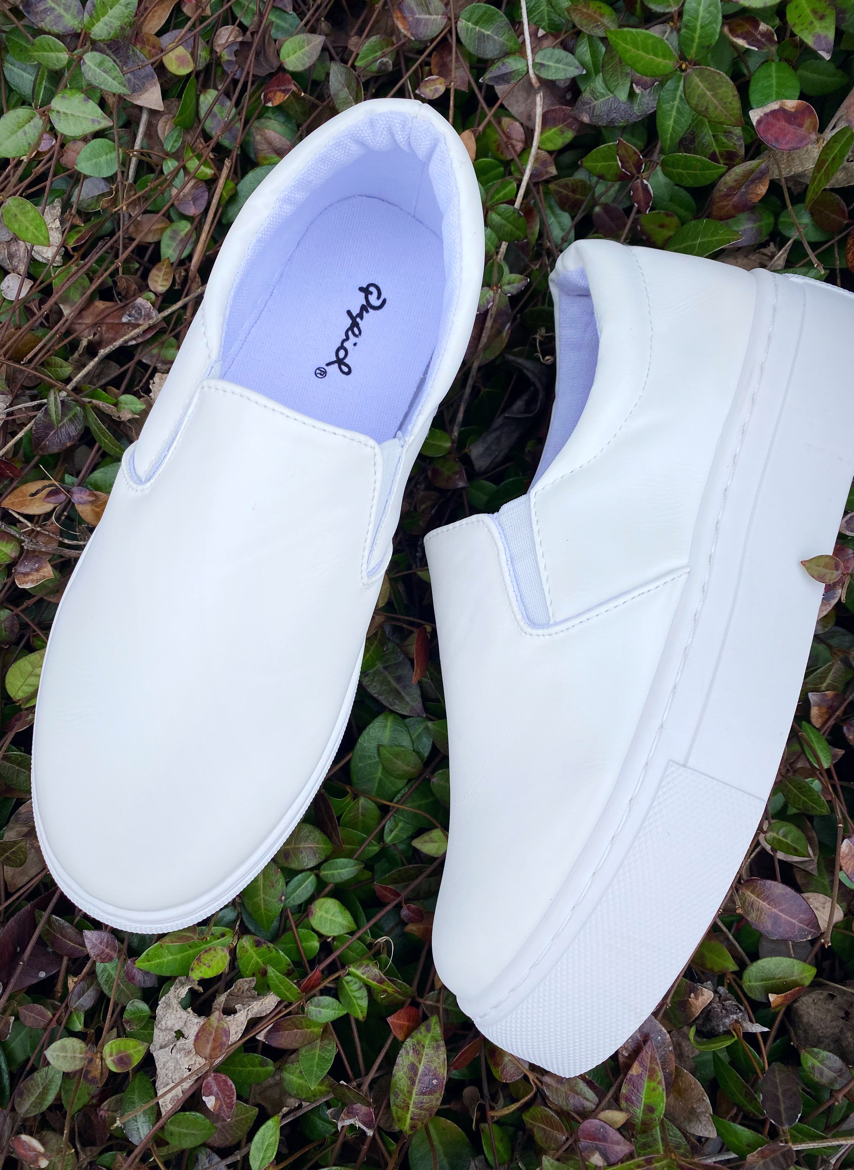 white faux leather platform sneakers