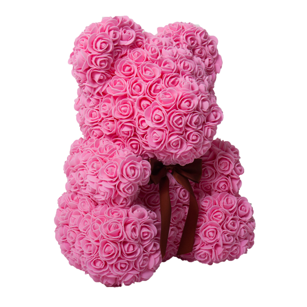 teddy bear in flowers