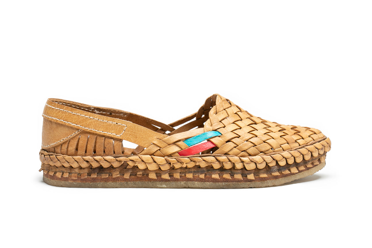 native flat slip on with woven leather strips