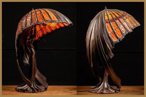 Bronze woman and orange slag glass art nouveau table lamp