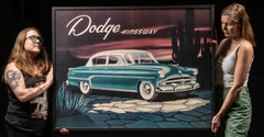 Vintage Dodge Kingsway Auto Poster, framed, being held by 2 woman