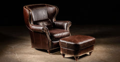 Vintage Leather Armchair and ottoman with lumbar pillow at Industrial Artifacts