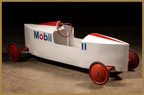 Vintage Mobil branded gravity racer or soapbox derby car