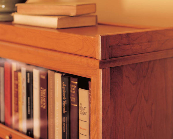 Barrister Bookcase glass door shelf section protects treasured books.