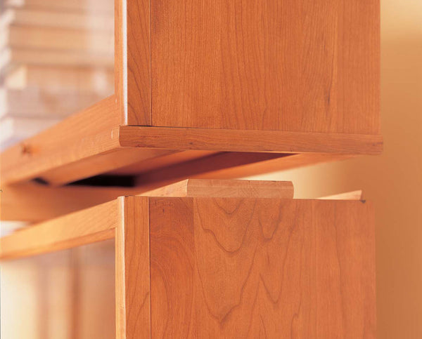 Hale Barrister Bookcase shelf sections stack and interlock for a customizable height. 