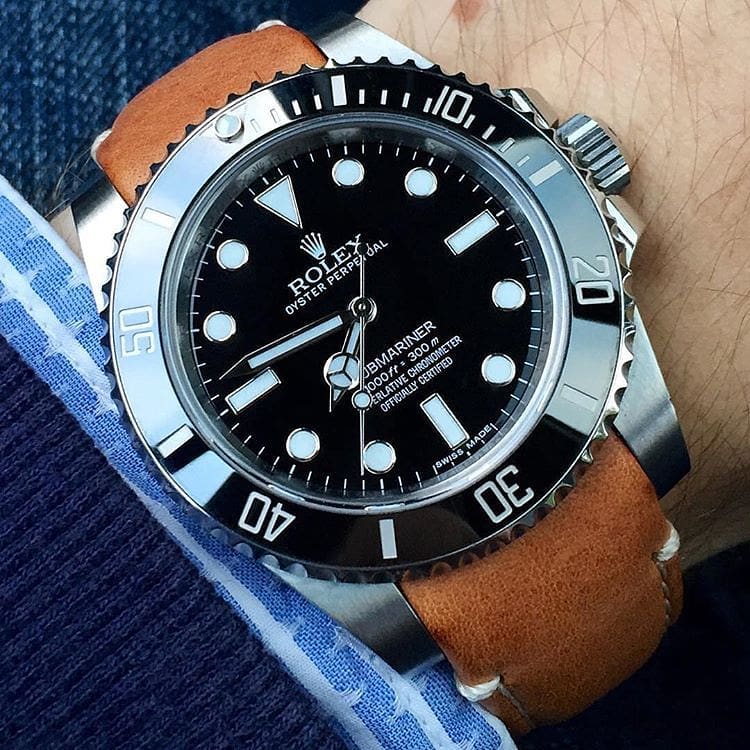 rolex submariner on tan leather